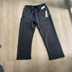 Essential “fear Of God” Black Uncuffed Sweats 