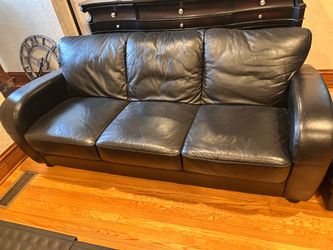 Leather couch with Ottoman