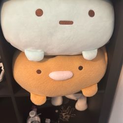Sumikko Gurashi of San-X in the form of a soft plush toy.