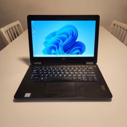 Dell Latitude E7470 laptop computer  13.3-inch  Intel Core i7-6600U X2 2.6GHz  8GB RAM 120GB SSD  Windows 11 pro. Microsoft office installed.  Nothing