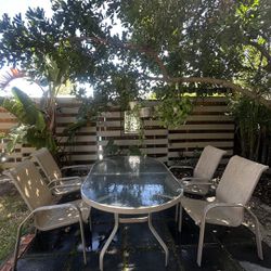 Outdoor Glass table w/ 4 Chairs