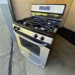 GE gas stove 4 burners stainless st & black color 30”