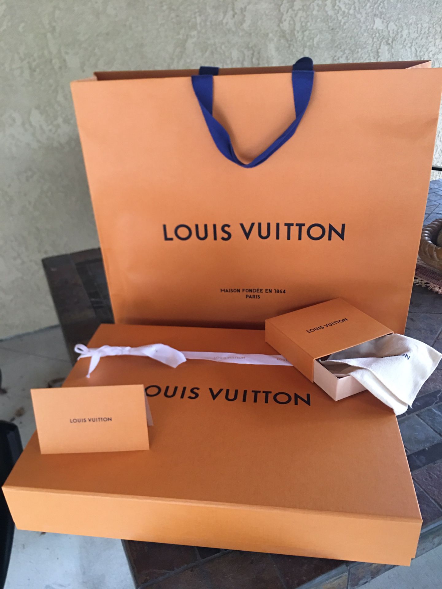 Louis Vuitton gift bag and boxes