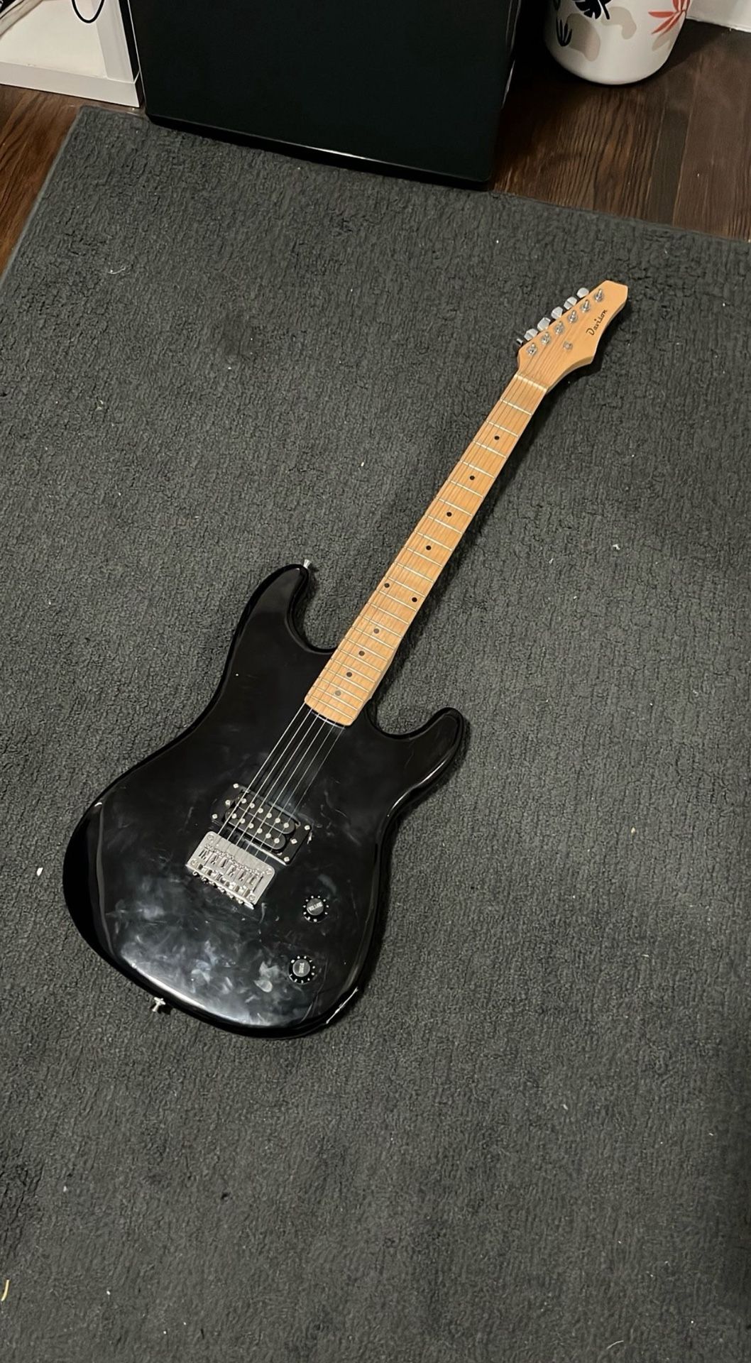 Black guitar too busy to play