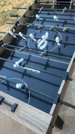 Triumph branded foosball table