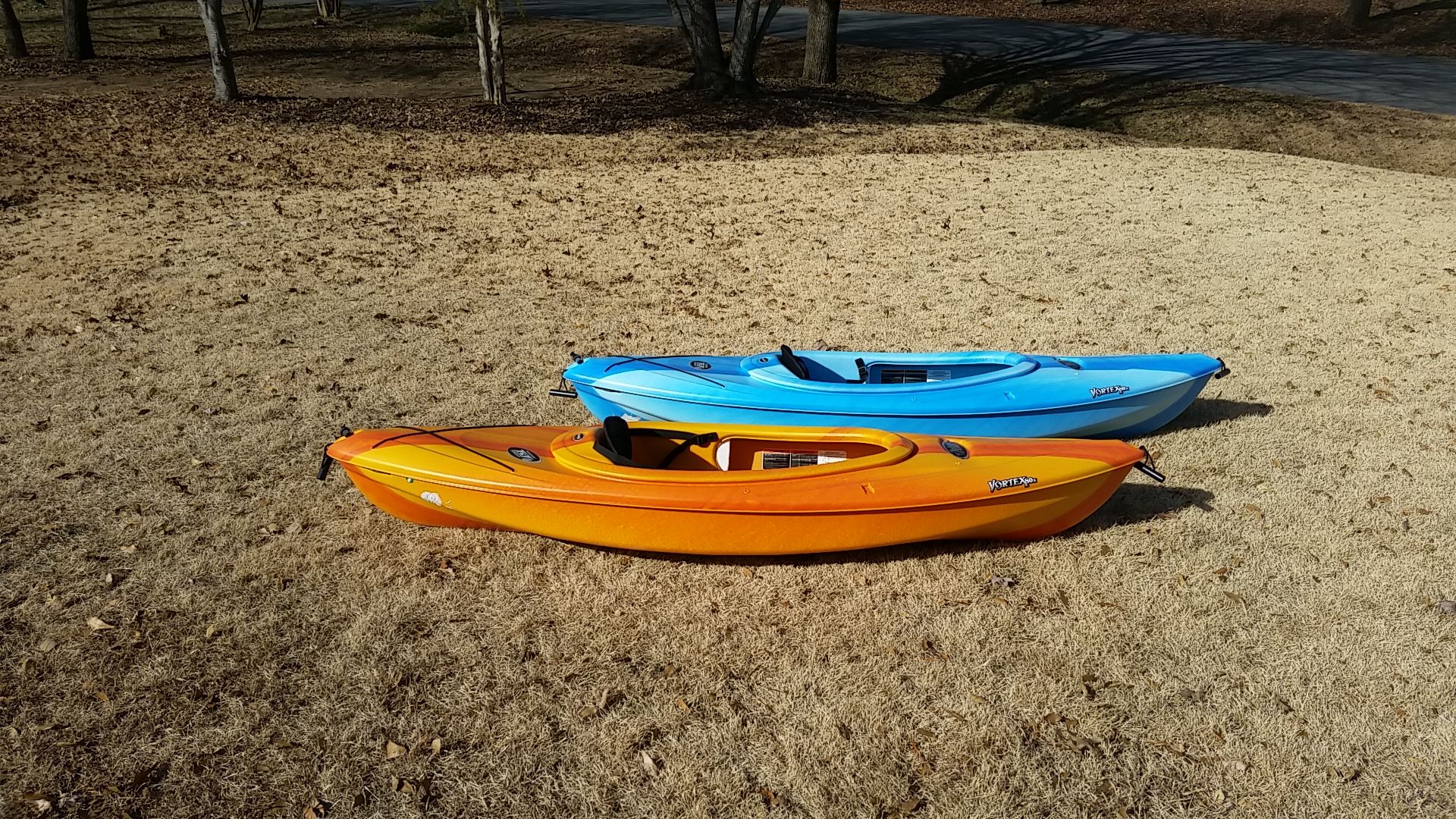Used Pelican Vortex 80x Kayaks, 1 orange, 1 blue, Single Person for