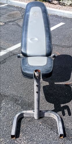 Weight Bench, pull bar, weights, and large solid rack