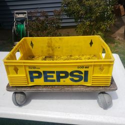 PEPSI SODA CRATE YELLOW HARD PLASTIC HOLDS 500 ML BOTTLES 18" x 12" x5", On Wheel