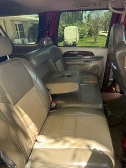 2003 ford excursion Eddie Bauer front seats middle row and console