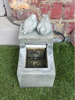 Small stone outdoor fountain