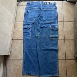 baggy wide leg blue interstate cargo jeans with interstate “IS” embroidery