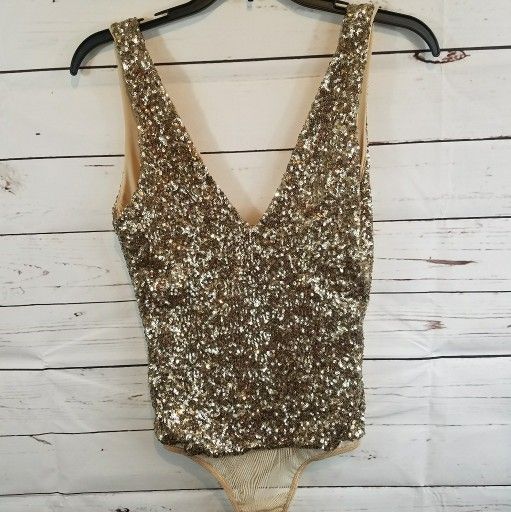Bebe Addiction Gold Sequin Plunge thong bodysuit