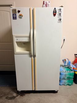 GE Side-by-Side Refrigerator with Ice and Water Dispenser