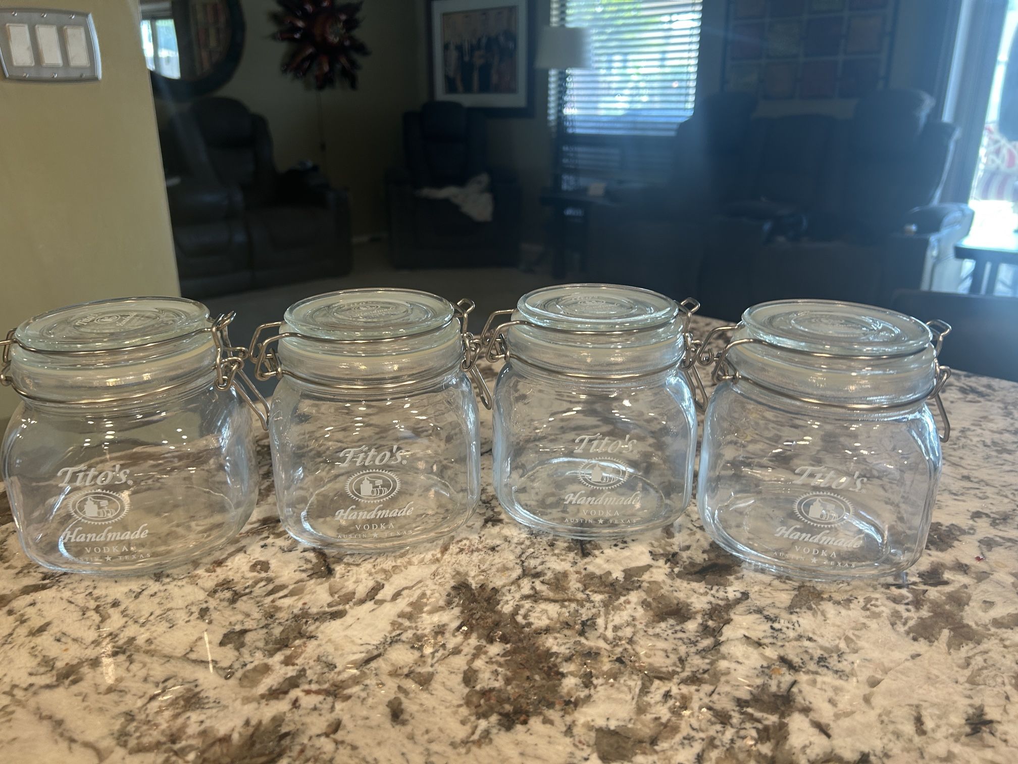Tito’s handmade canister set of four with snap lids brand new never been used