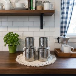 Set Of 4 Stainless Steel Canisters.