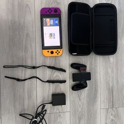 Nintendo switch with charger, controller, joy con sticks and MINECRAFT GAME installed