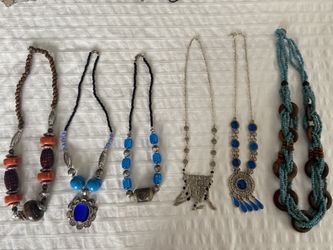 Necklaces $15 each. Purchased in Morocco and Bali.