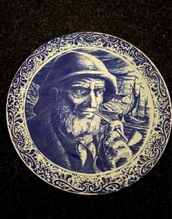 Vintage Ceramic Nautical Plate With a Detailed Portrait of a Fisherman Holding a Pipe.