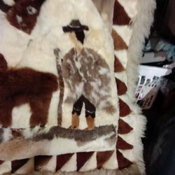 Fur made blanket throw