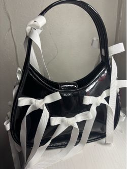 Black bow coach purse