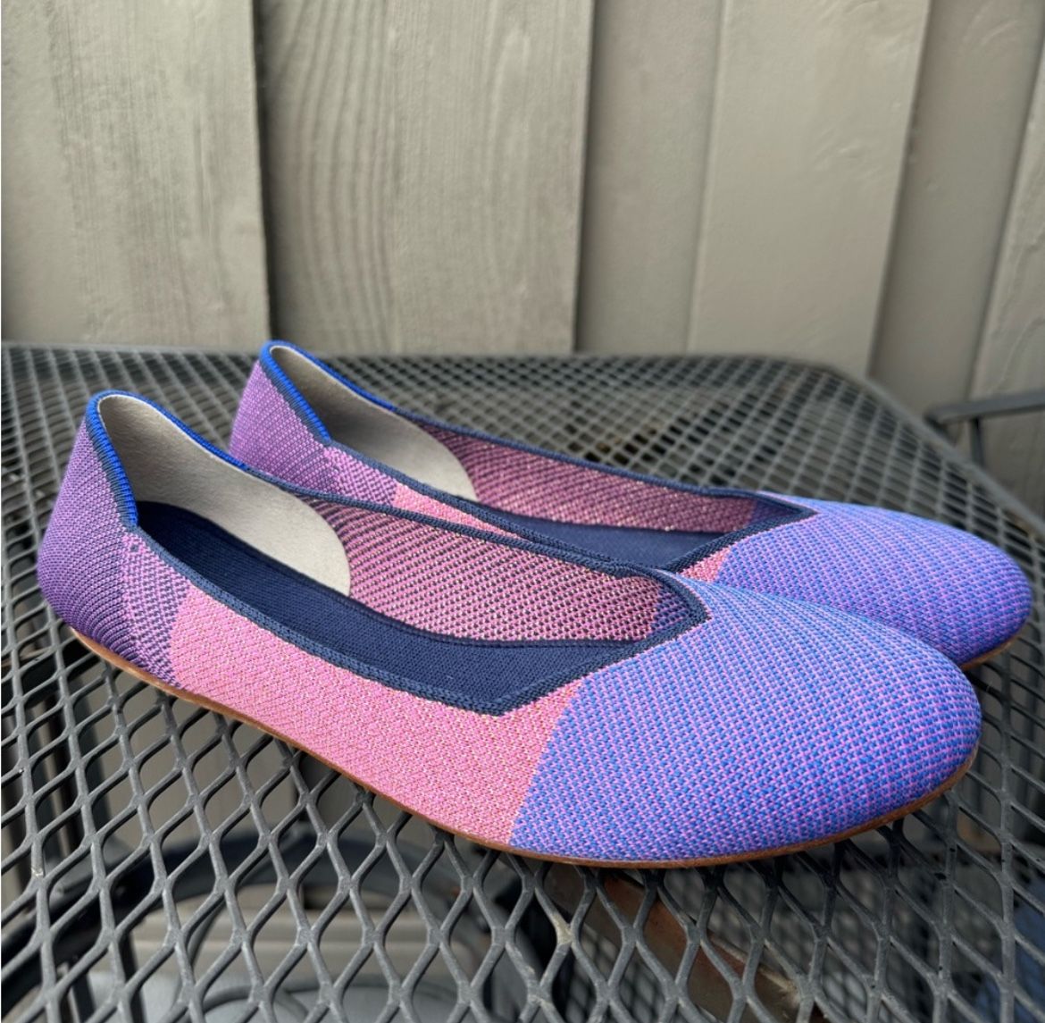 Rothy's flats in women's size 11 in a purple/fuchsia color.