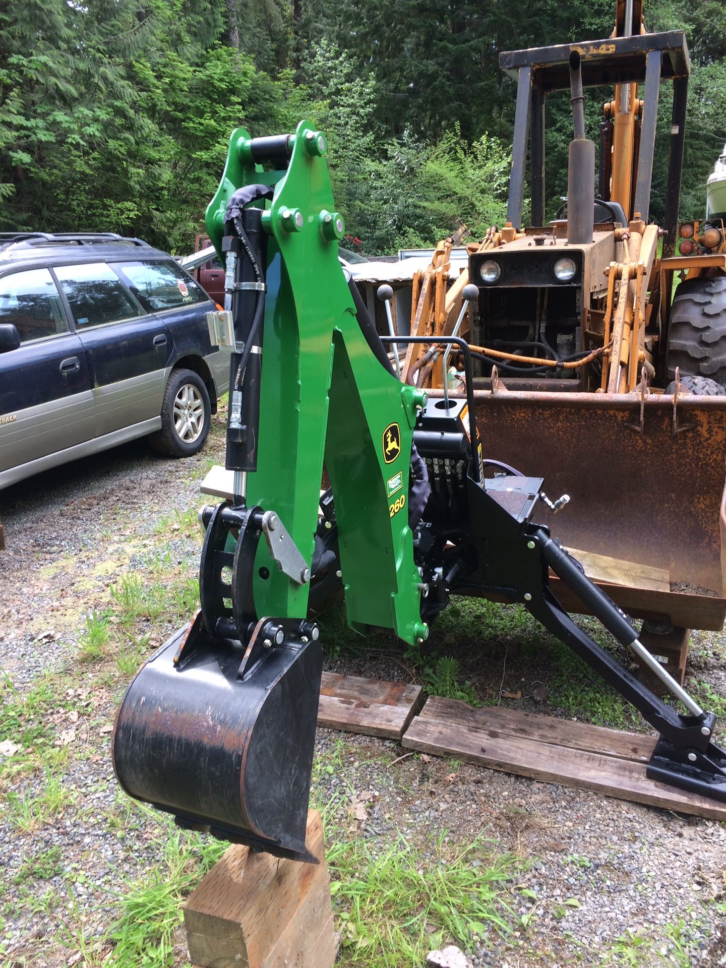 John Deere 260 Backhoe attachment! This is a new unit, has never broke dirt! This is made for your newer sub compact John Deere tractors. I have a ba