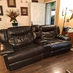 Beautiful Dark Brown Leather Couch With Both Reclining ends.