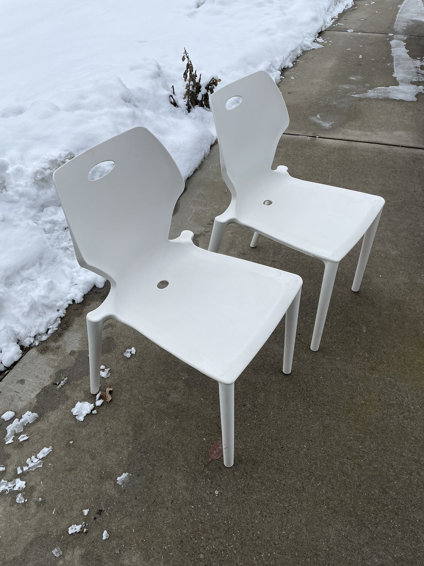 White Plastic Heavy Duty Chairs, $25 each