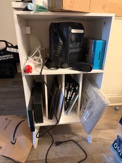 White shelf with pluggable outlet