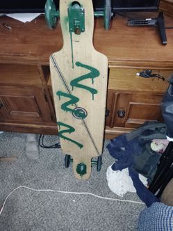Longboard Skateboard with Green Trucks