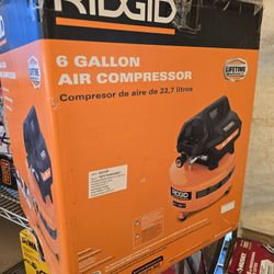 Ridgid RIDGID
6 Gal. 150 PSI Portable Electric Oil-Free Jobsite Pancake Air Compressor with Dual Pressure Gauges and 2-Quick Couplers