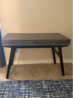 Grey an black desk and universal  bed rails