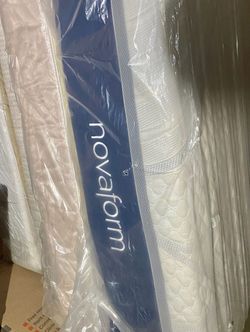THICK MATTRESS QUEEN SIZE NOVAFORM BRAND ..STILL COVER PLASTIC..VERY GOOD CONDITION CAME WITH BOX SPRING