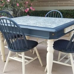 Charming Table And Four Chair Set
