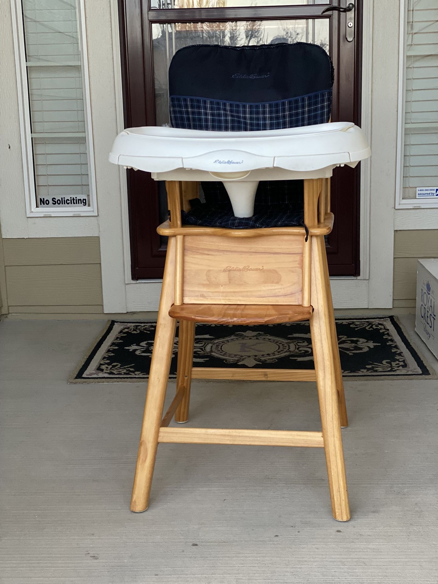 Highchair — Eddie Bauer, wood with blue seat cover