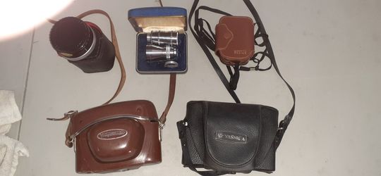 Encounter Vintage Cameras With Accessories