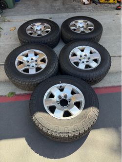FJ Cruiser 17” OEM Wheels with Bridgestone Dueler A/T Revo 3 tires