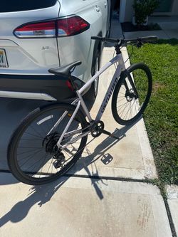 Pink Specialized Sirrus X 2.0 Hybrid Bike