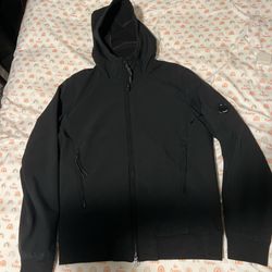 CP company shell-R hooded jacket with zip pockets and Cp company iconic lense  Authentic through certilogo Size 50 which is L(measurements provided in