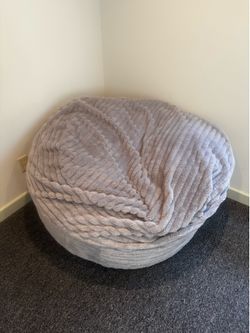 Faux fur bean bag that converts to mattress