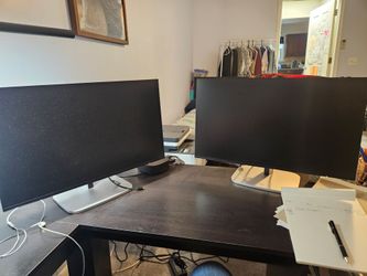 Pair of HP 23.8in monitors.