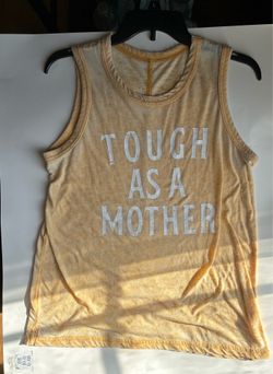 Yellow tank top in women