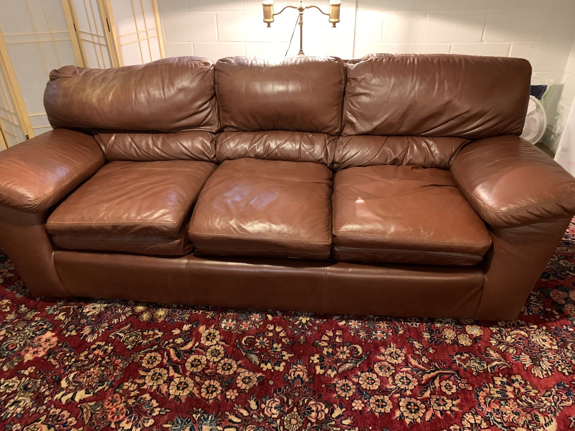 Leather down filled sofa