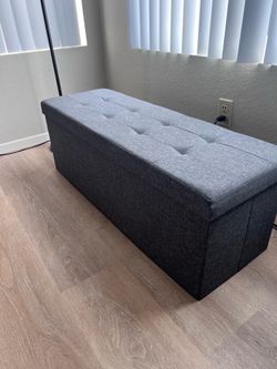 Grey storage bench