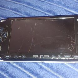 Psp for parts or repairs 
Cracked screen 