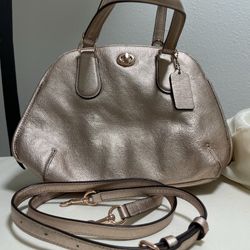 Coach purse Pink With Rose Gold Accents 