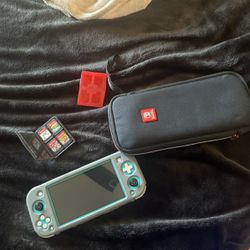 Nintendo Switch Lite And 5 Games 