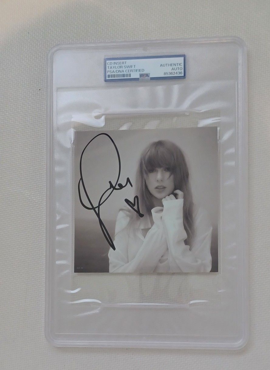 TAYLOR SWIFT AUTOGRAPHED CD INSERT SLABBED AND PSA AUTHENICATION