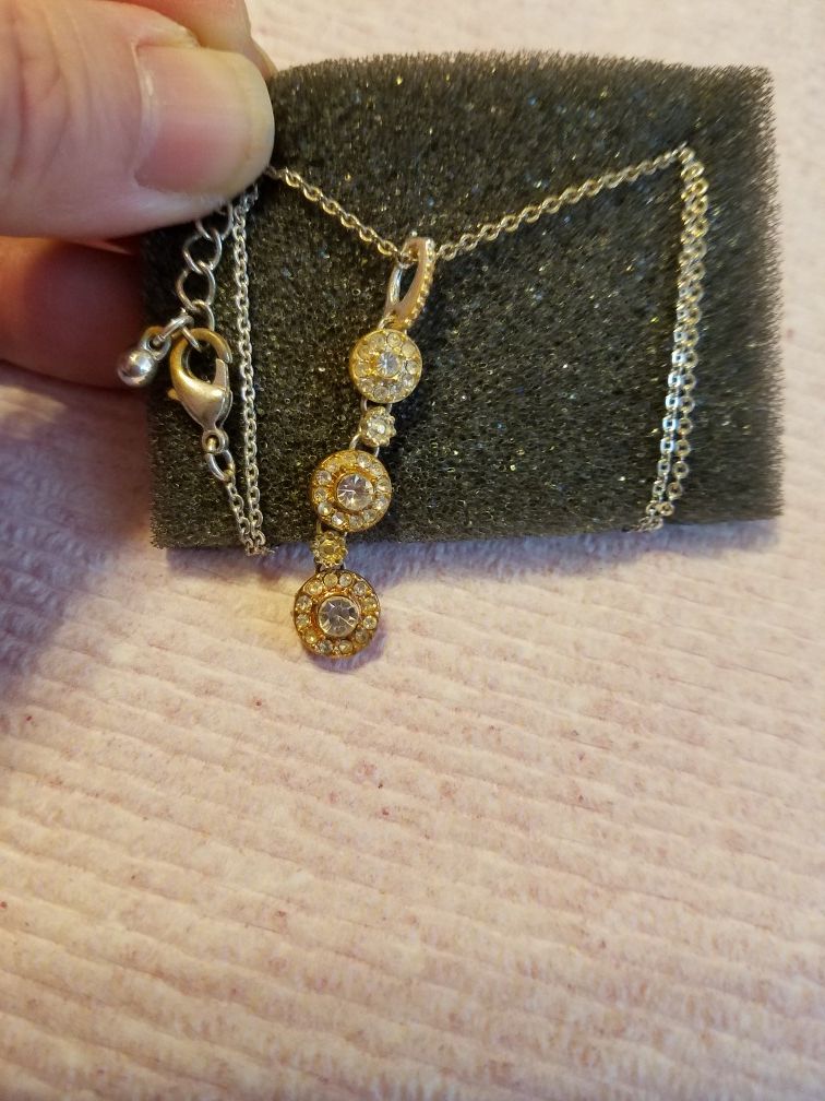 From Avon CZ diamond(April birthstone) gold plated Necklace Please go to my page and see other items that I have listed thank you for your interest