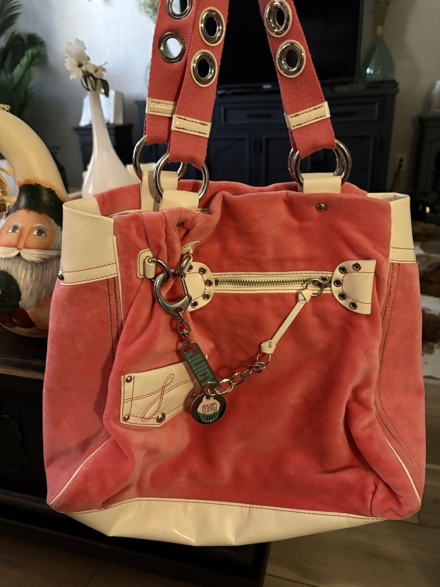 Vintage pink Juicy Couture tote bag with a "Cupcake" charm.